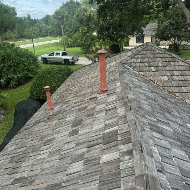 Close-up of high-quality roof and chimney by Gotcha Covered Roofing